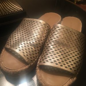 Open toe, gold sandals.